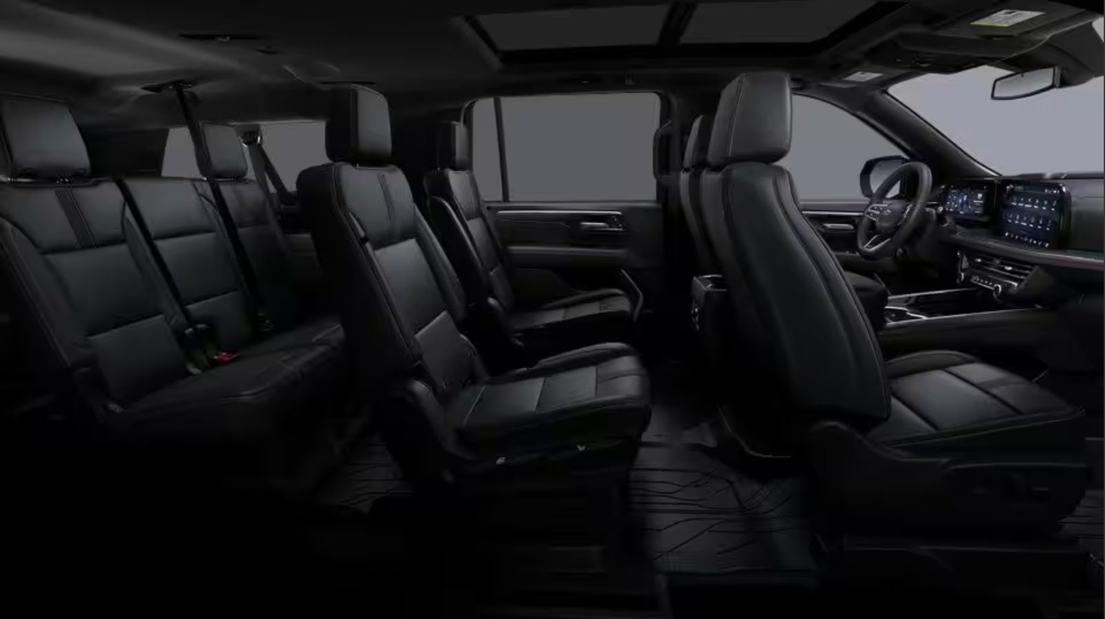 Black leather interior of the Suburban RST with captain’s chairs and third-row seating